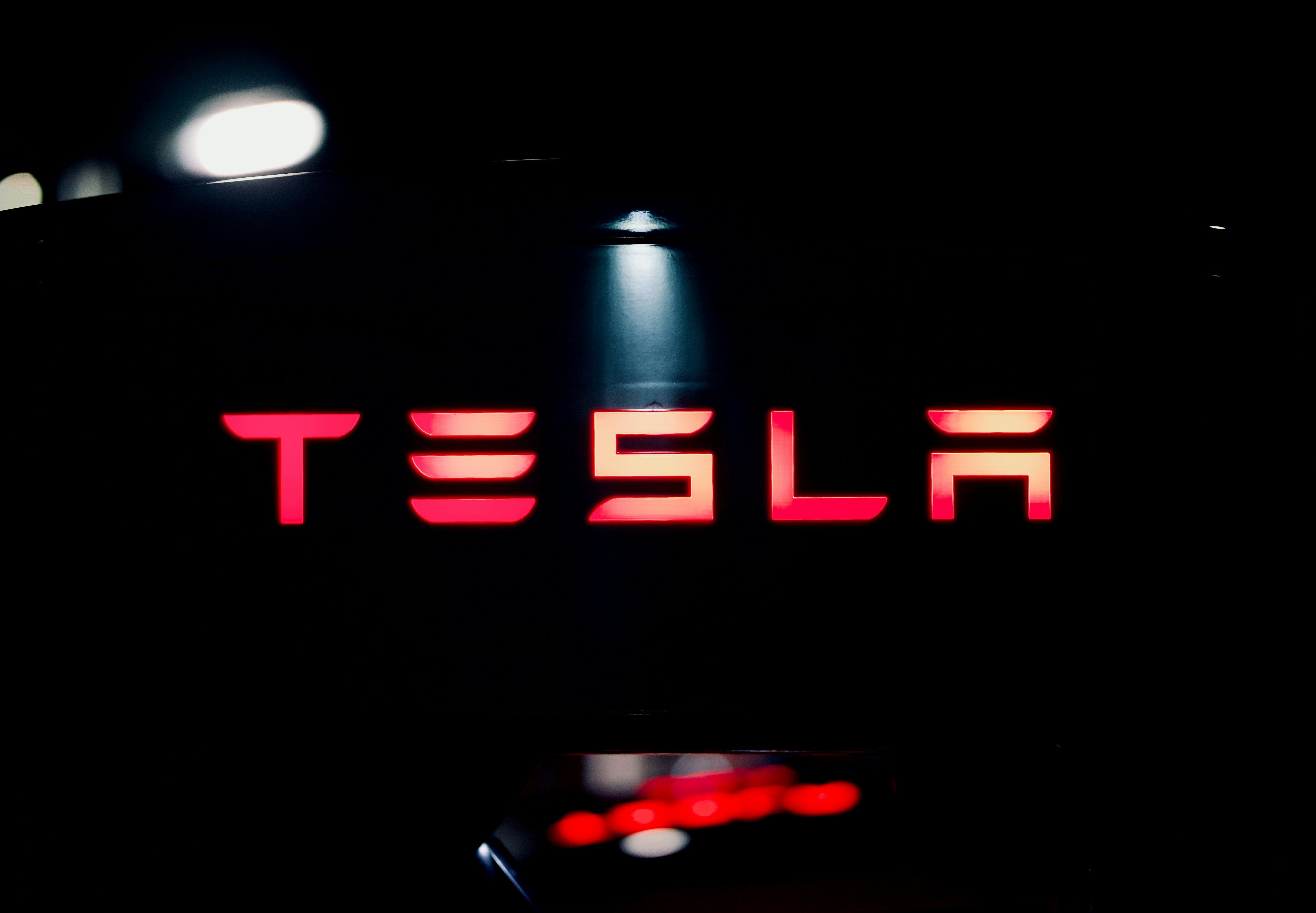 Main Image. Tesla Logo on the car's Speedometer