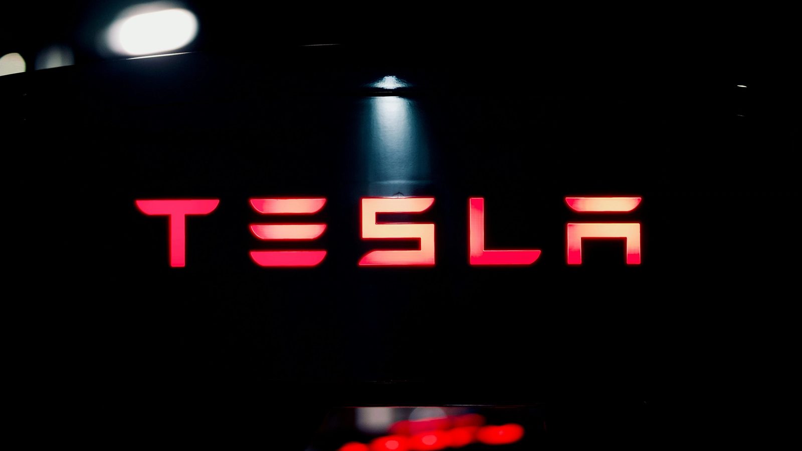 Main Image. Tesla Logo on the car's Speedometer