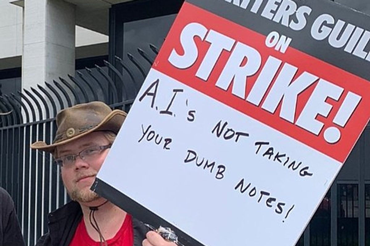 AI protest sign at the writer's guild association protest in 2023