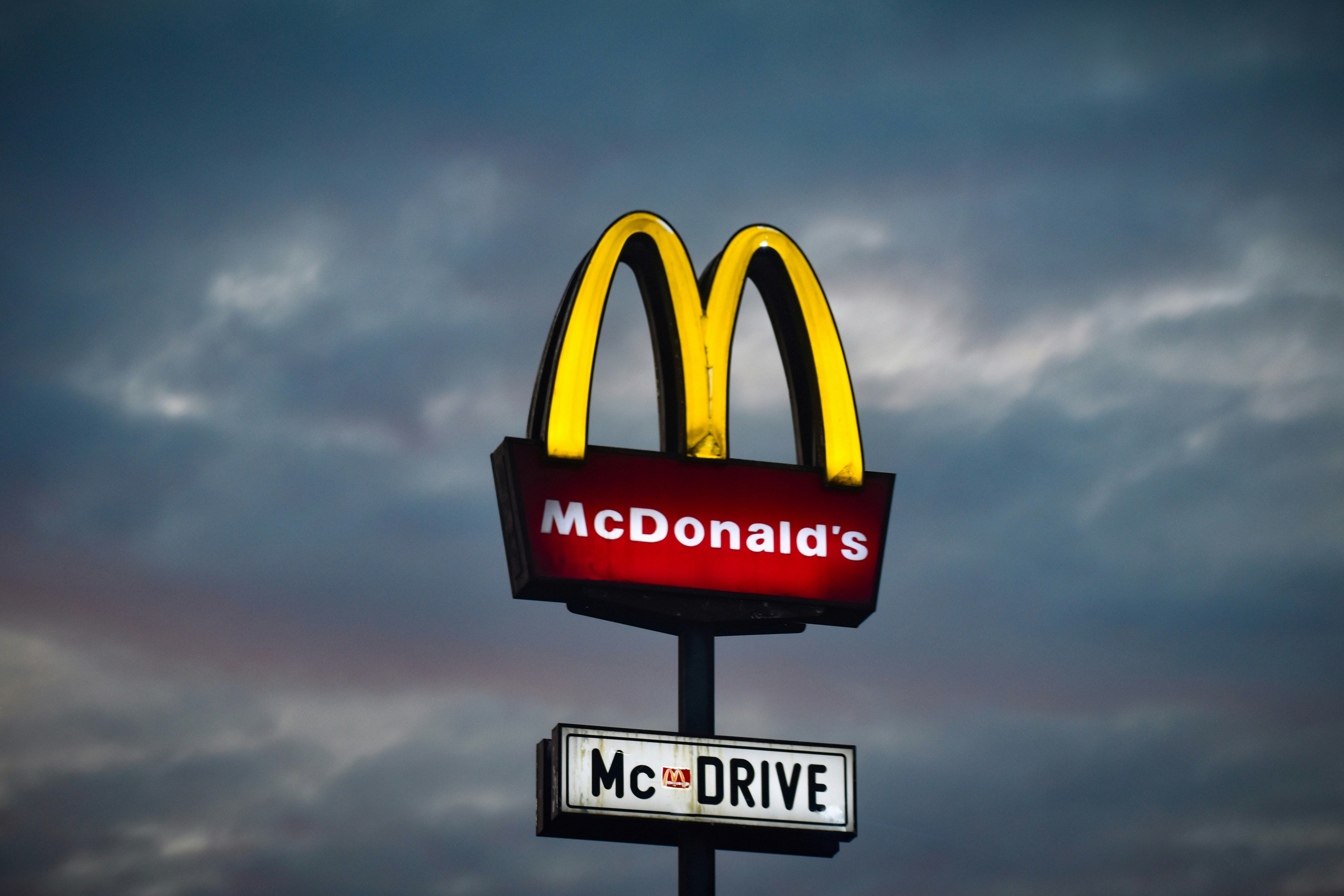 McDrive signage amidst a cloudy backdrop