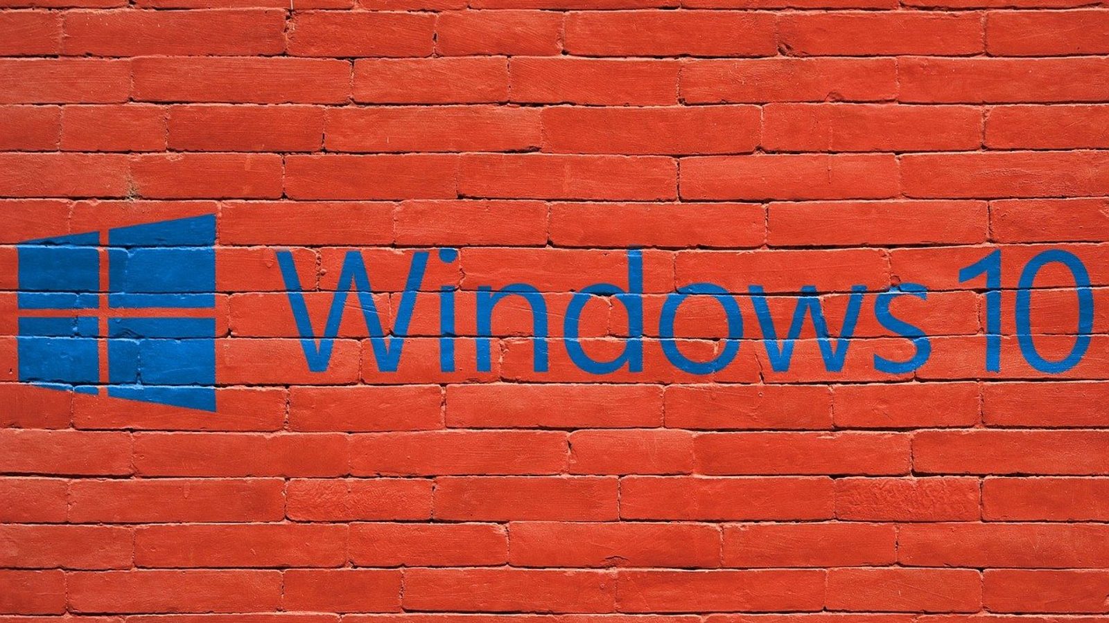 Main image: Windows 10 painted on a red wall.