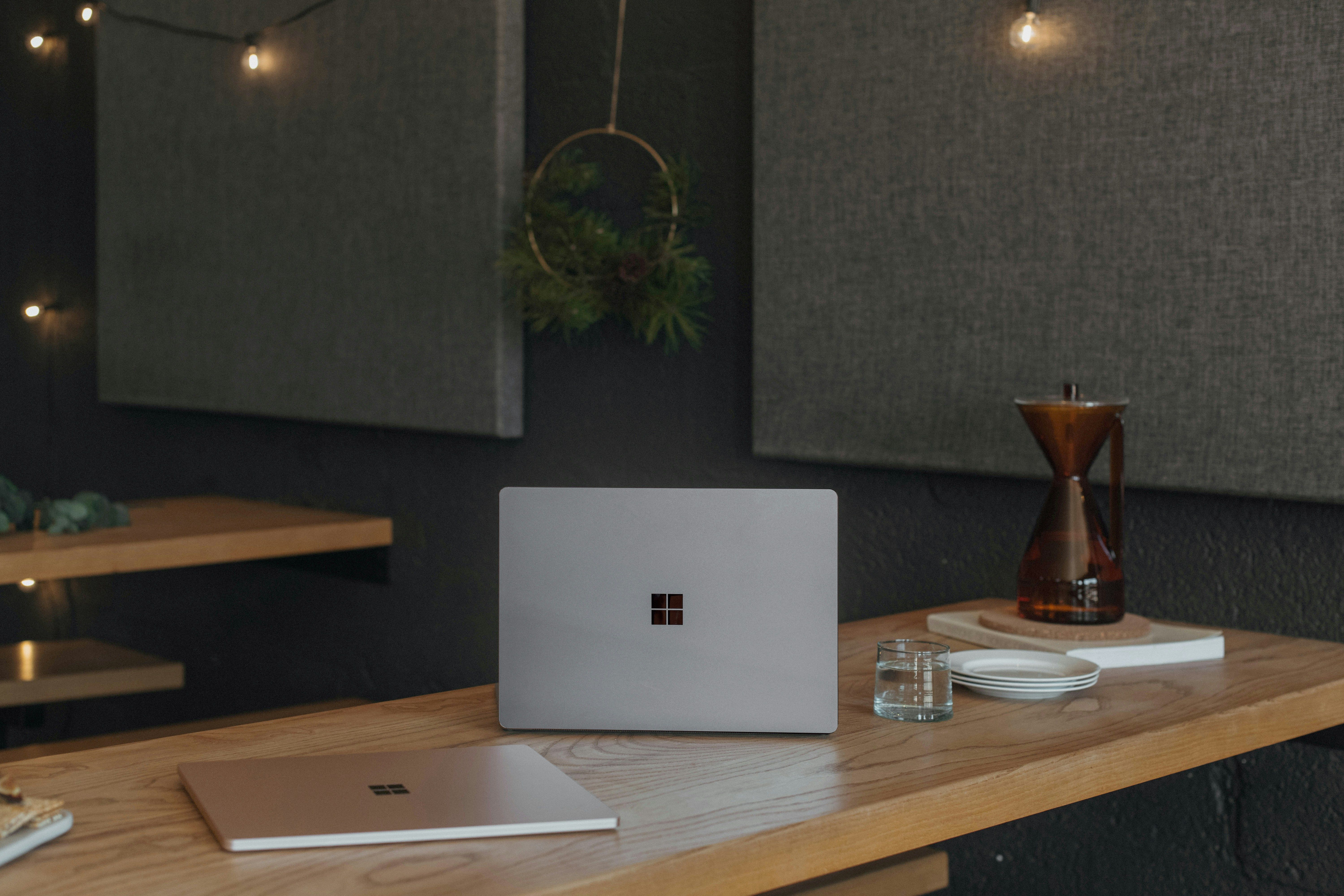 Microsoft laptop on a table at work