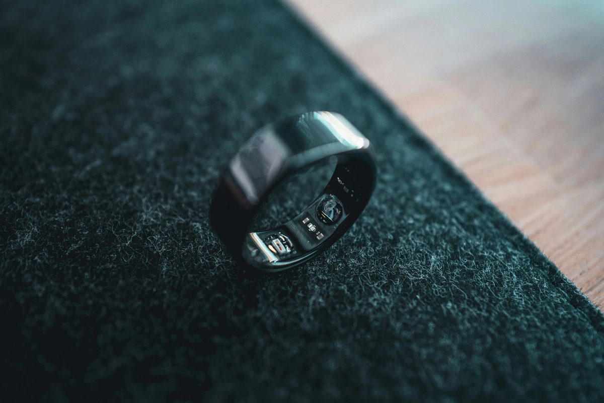 Close up of the Oura ring, a smart ring come health tracker
