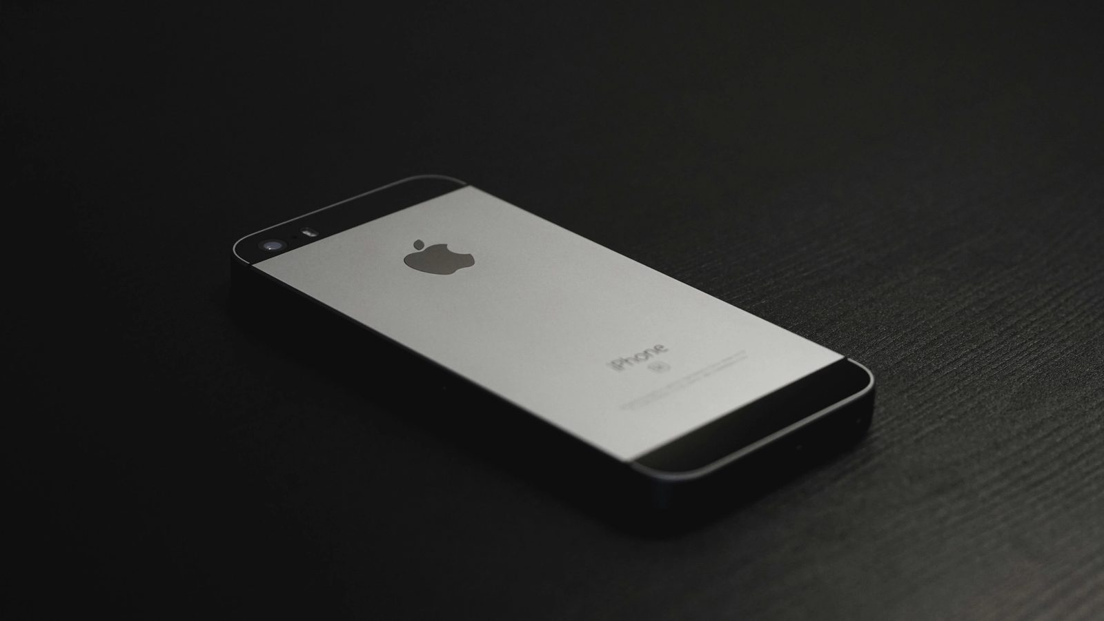 Main Image: A Grey iPhone SE