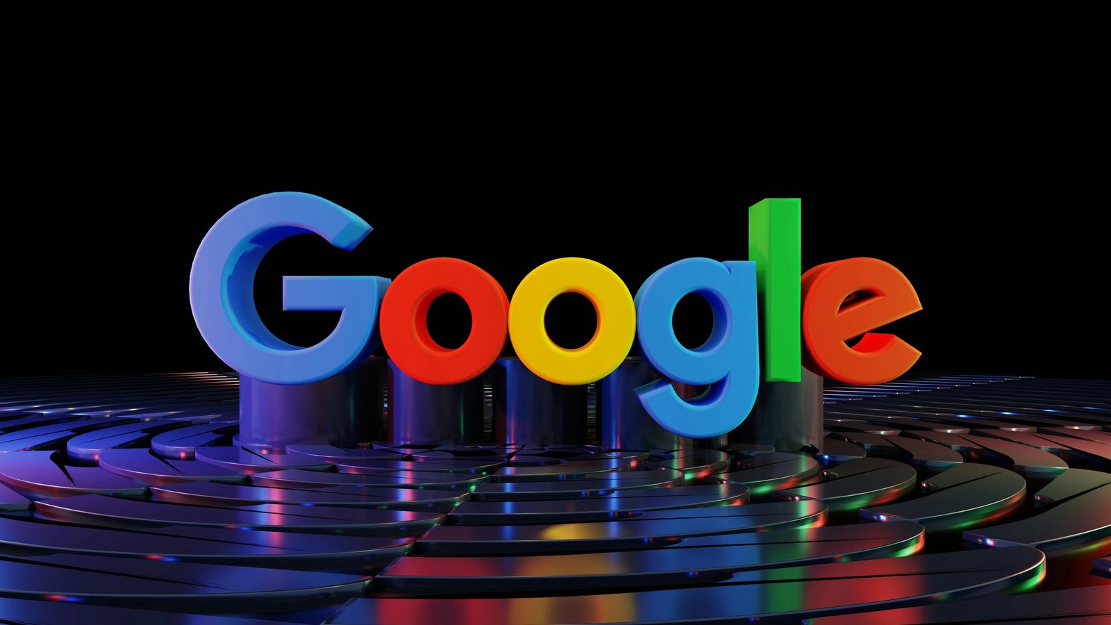 Main Image: Google logo displayed infront of a black backdrop