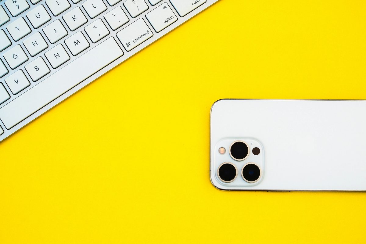 iPhone on a yellow background