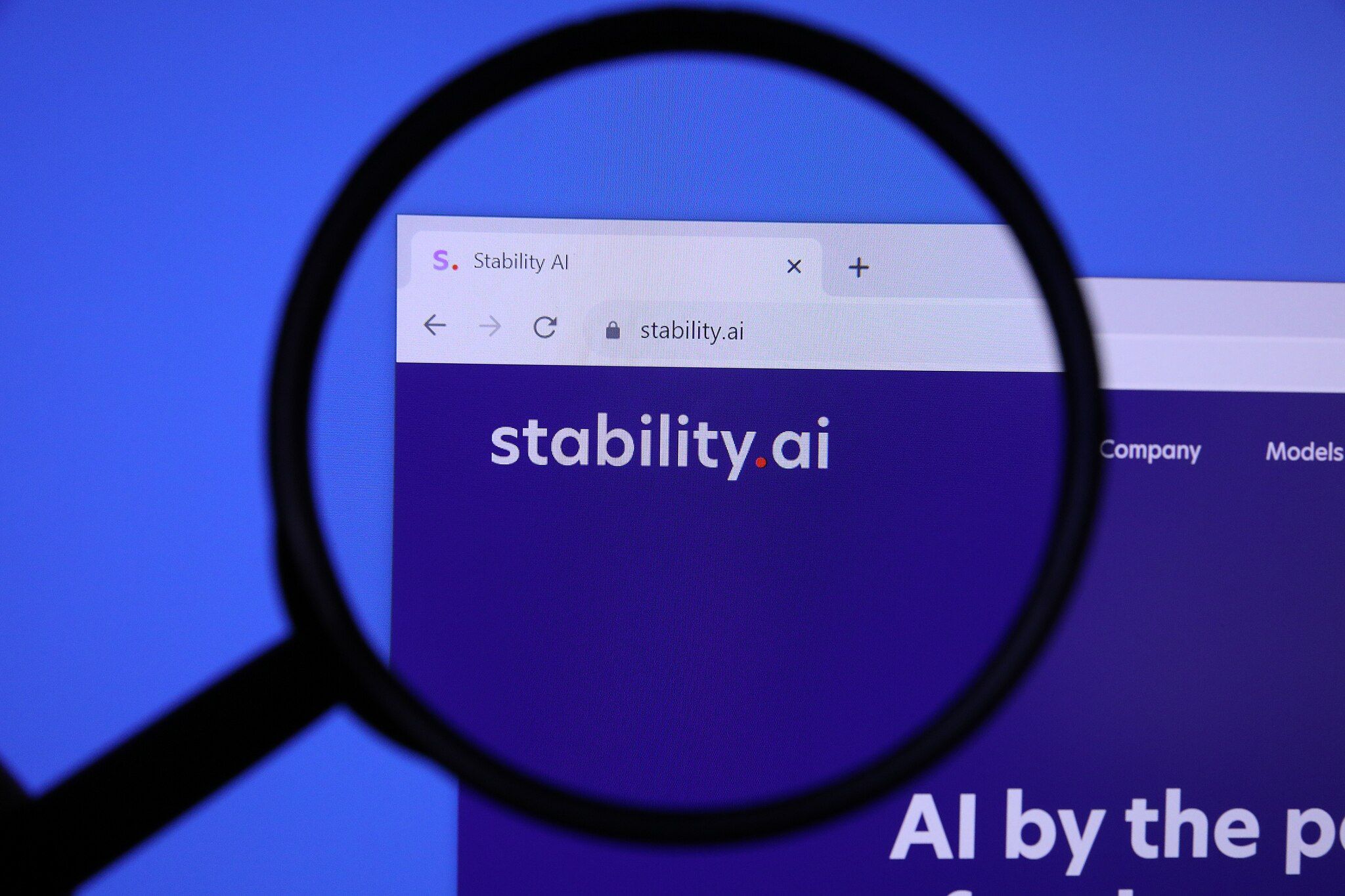 Main Image: A magnified section of Stability AI webpage focusing on the logo