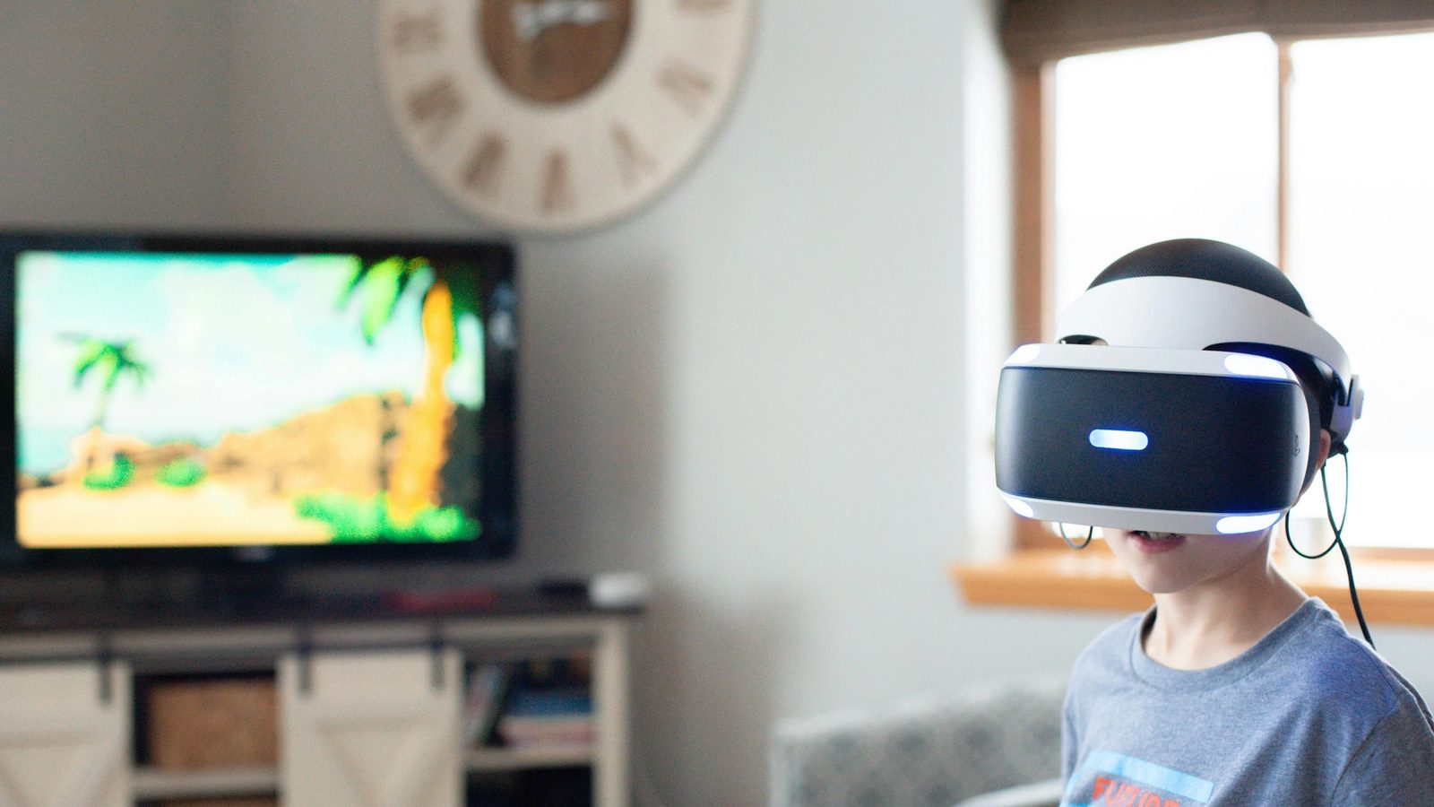 Main Image: Boy Wearing Black and White Virtual Reality Headset