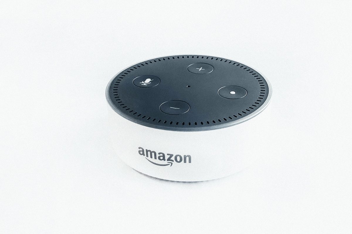 White and black Amazon Echo Dot