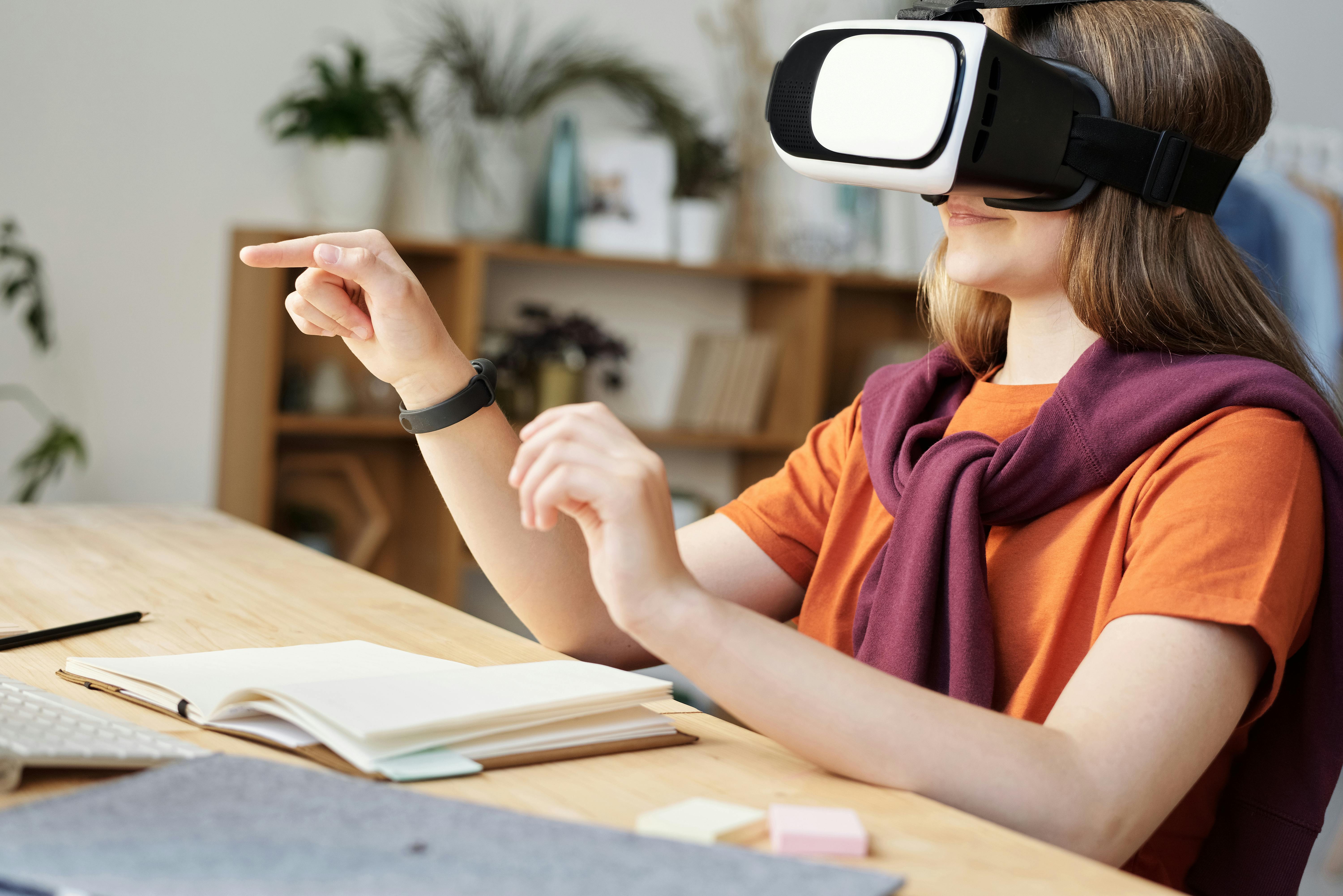 Girl wearing black and white virtual reality goggles