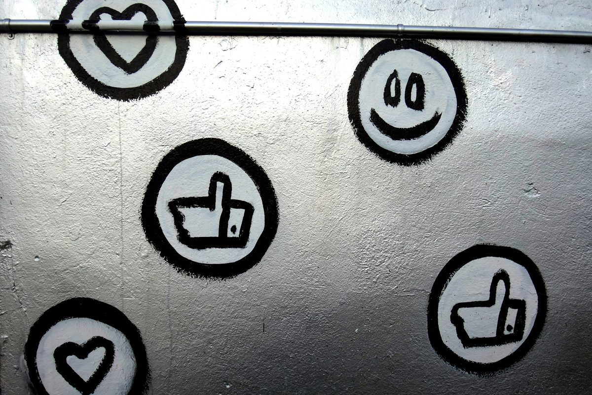 Emoji stickers that are on a wall
