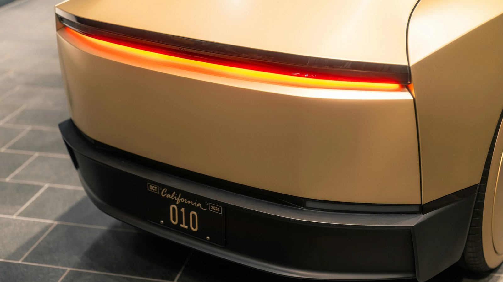 Main Image: Rear end of a Robotaxi