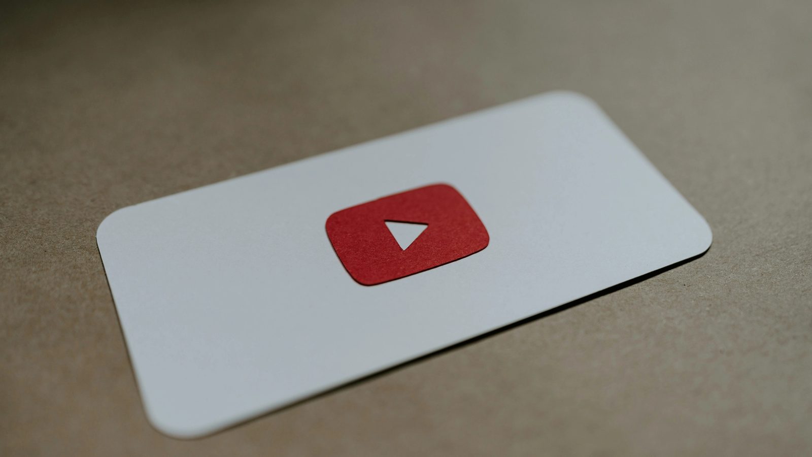 Main Image: Youtube icon set on a white carton
