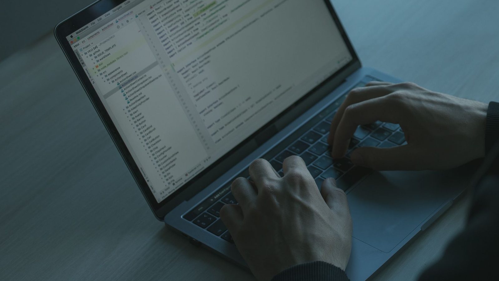 Writing code on a computer screen