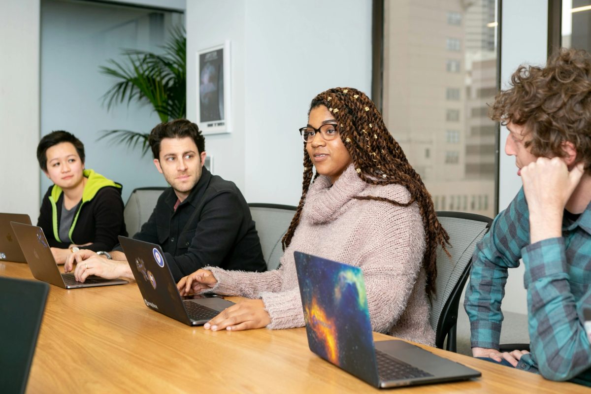 A team meeting taking place inside an office