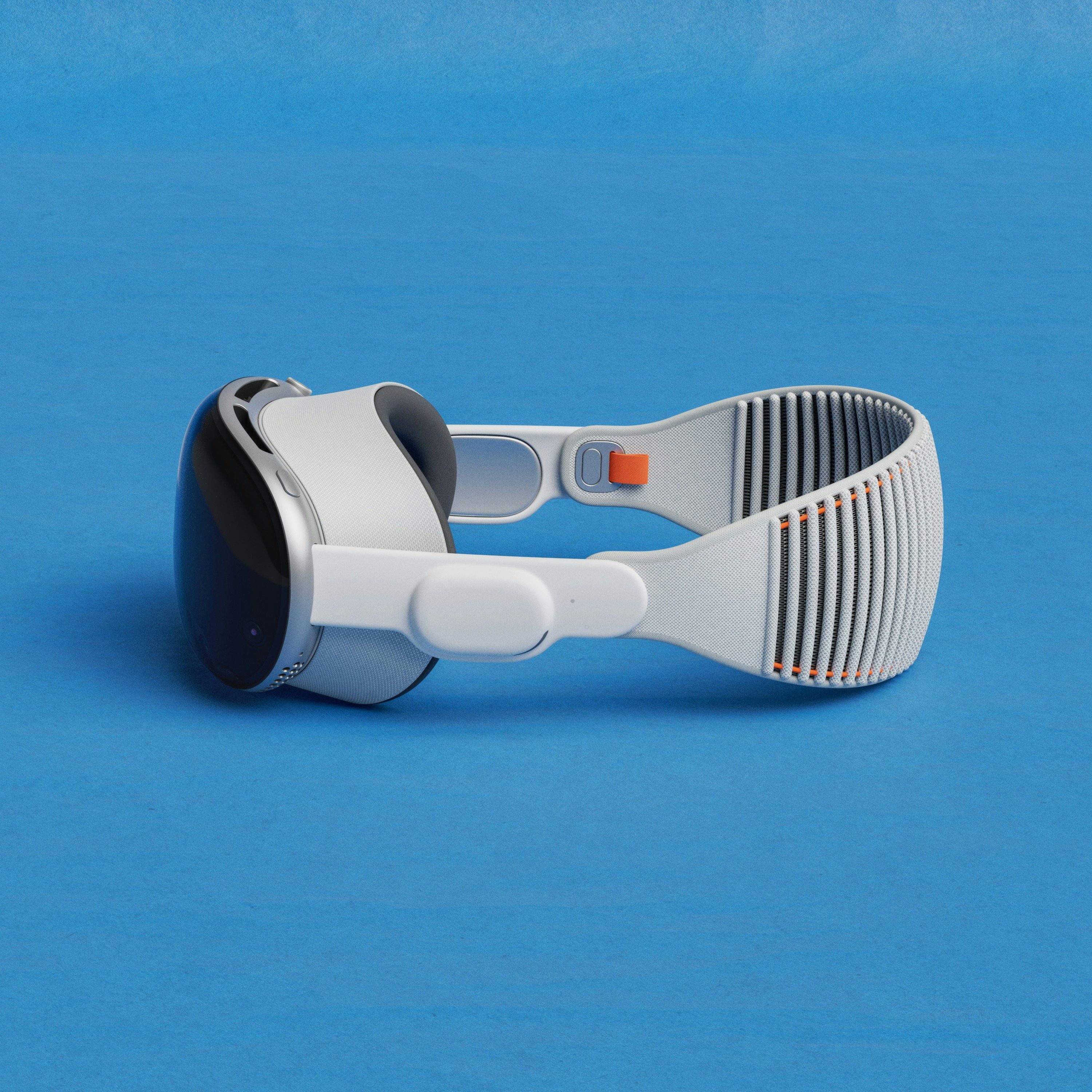 A pair of google glasses on a blue surface