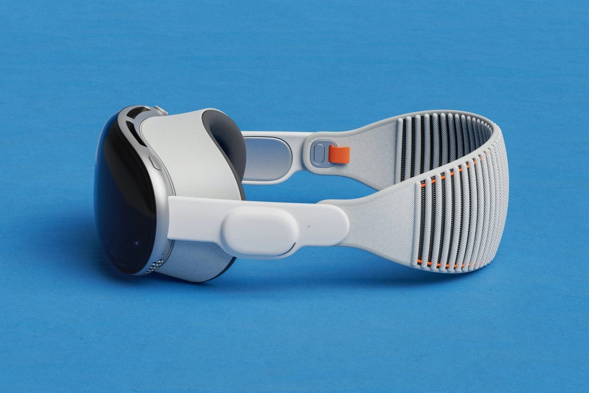 A pair of google glasses on a blue surface