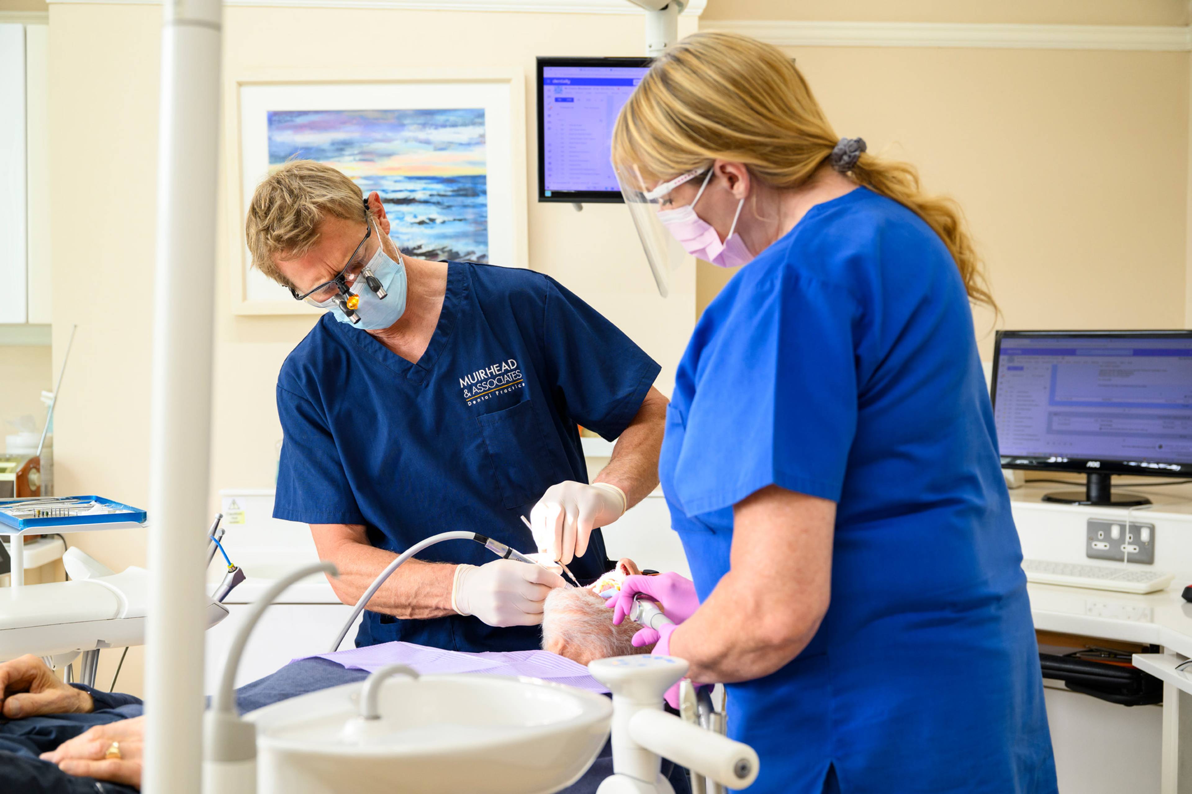 Rob Muirhead working on a patient