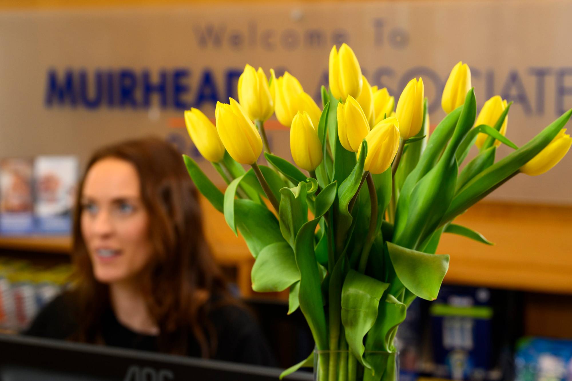 Tulips on the front desk of our practice