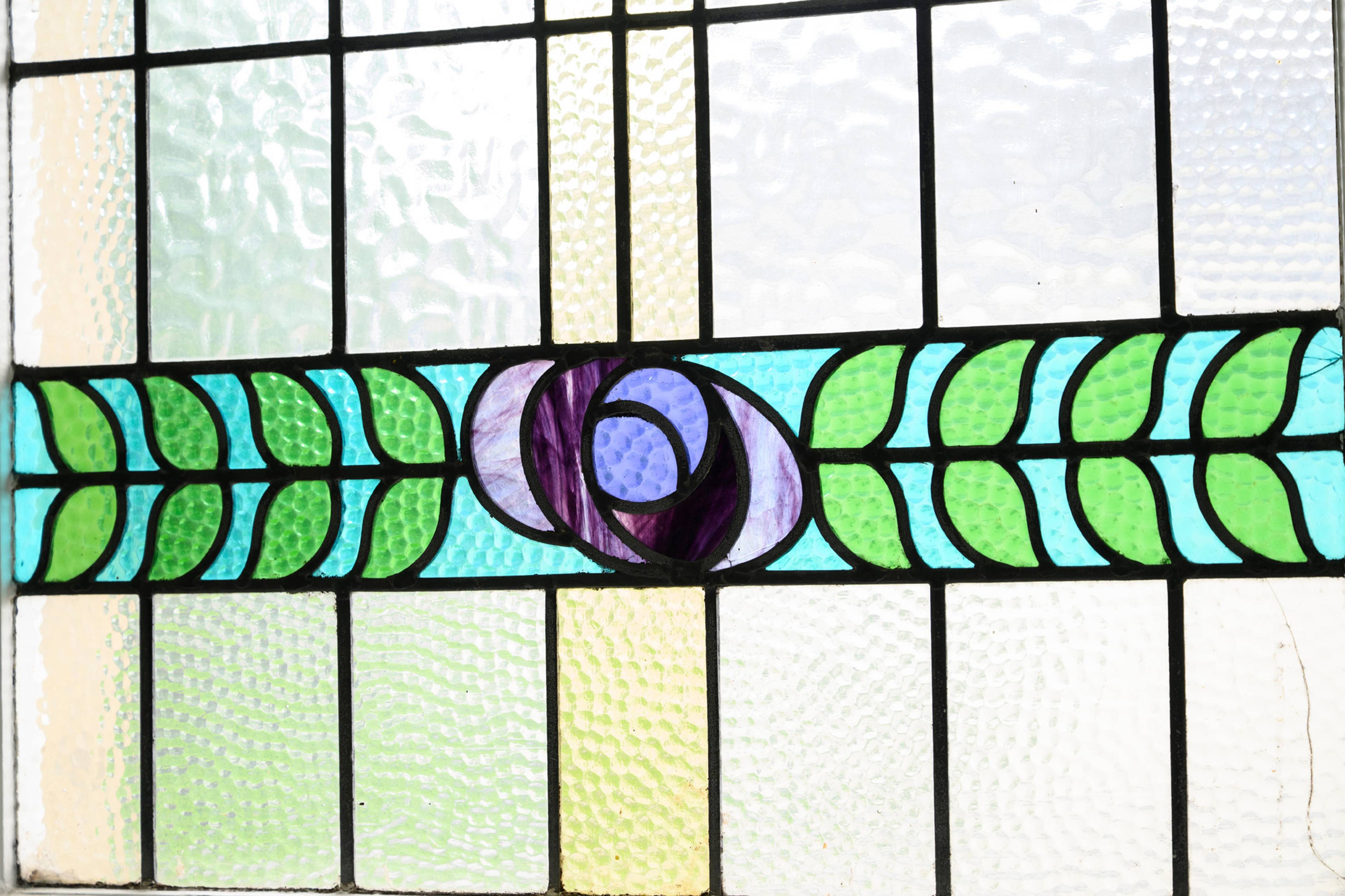 A close-up photo of one of our practice's stained glass windows