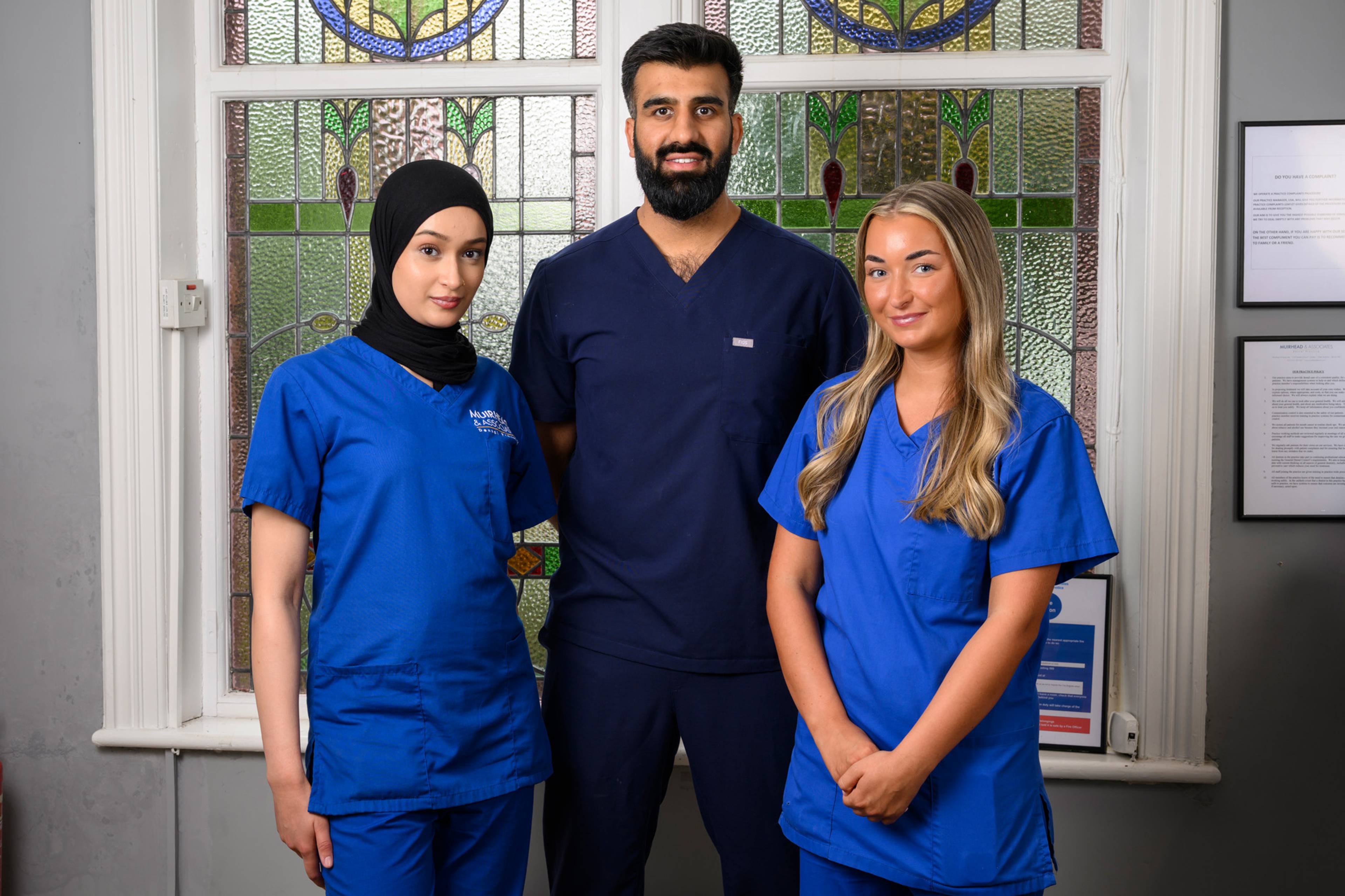 Ahmer and two dental nurses