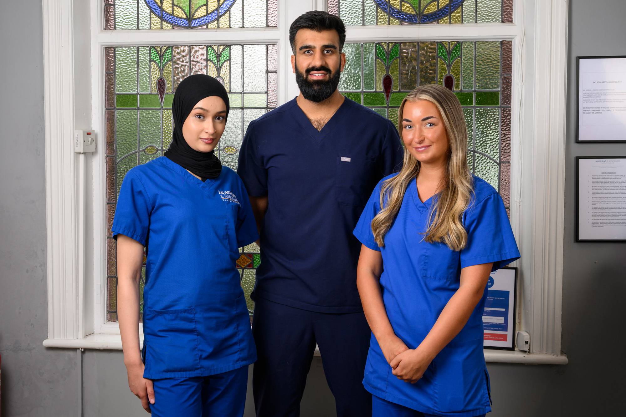 Ahmer and two dental nurses