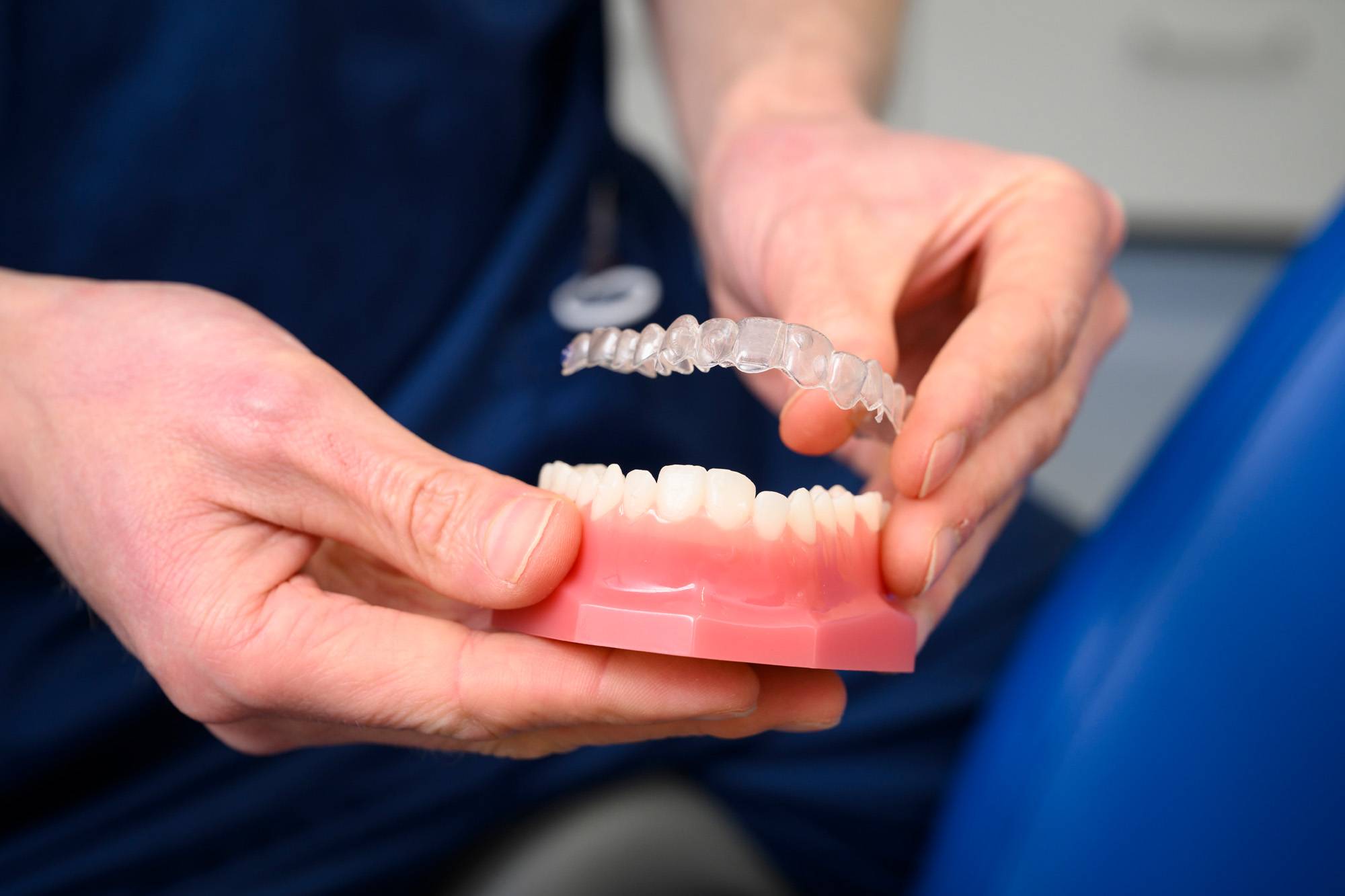 A leaflet for clear aligners showing before and after demonstrations