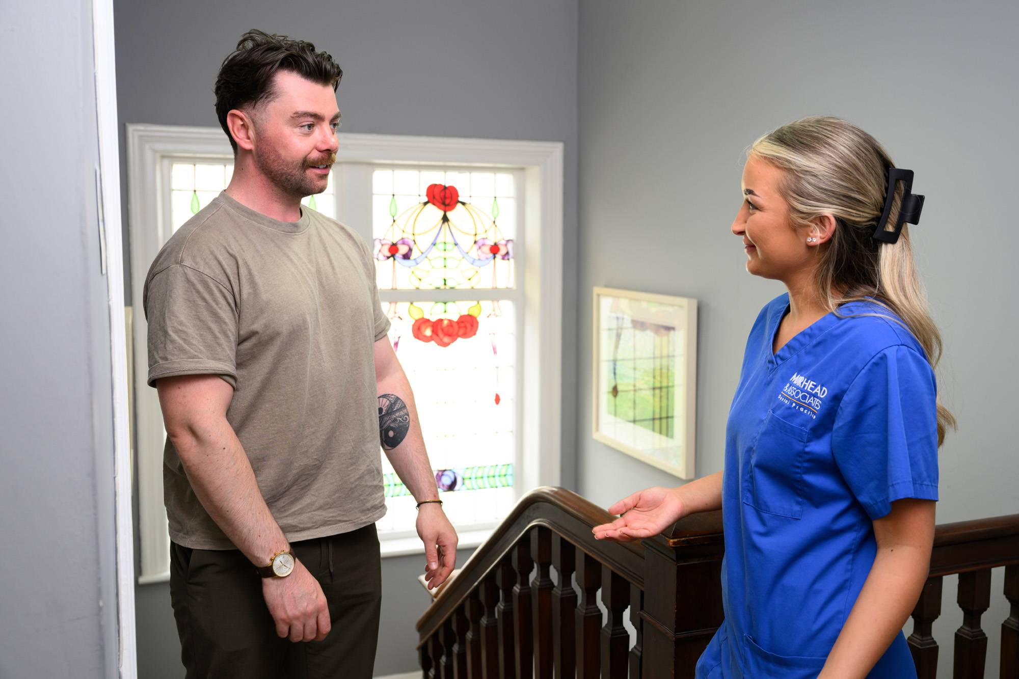 A patient speaking with our dental nurse Angel