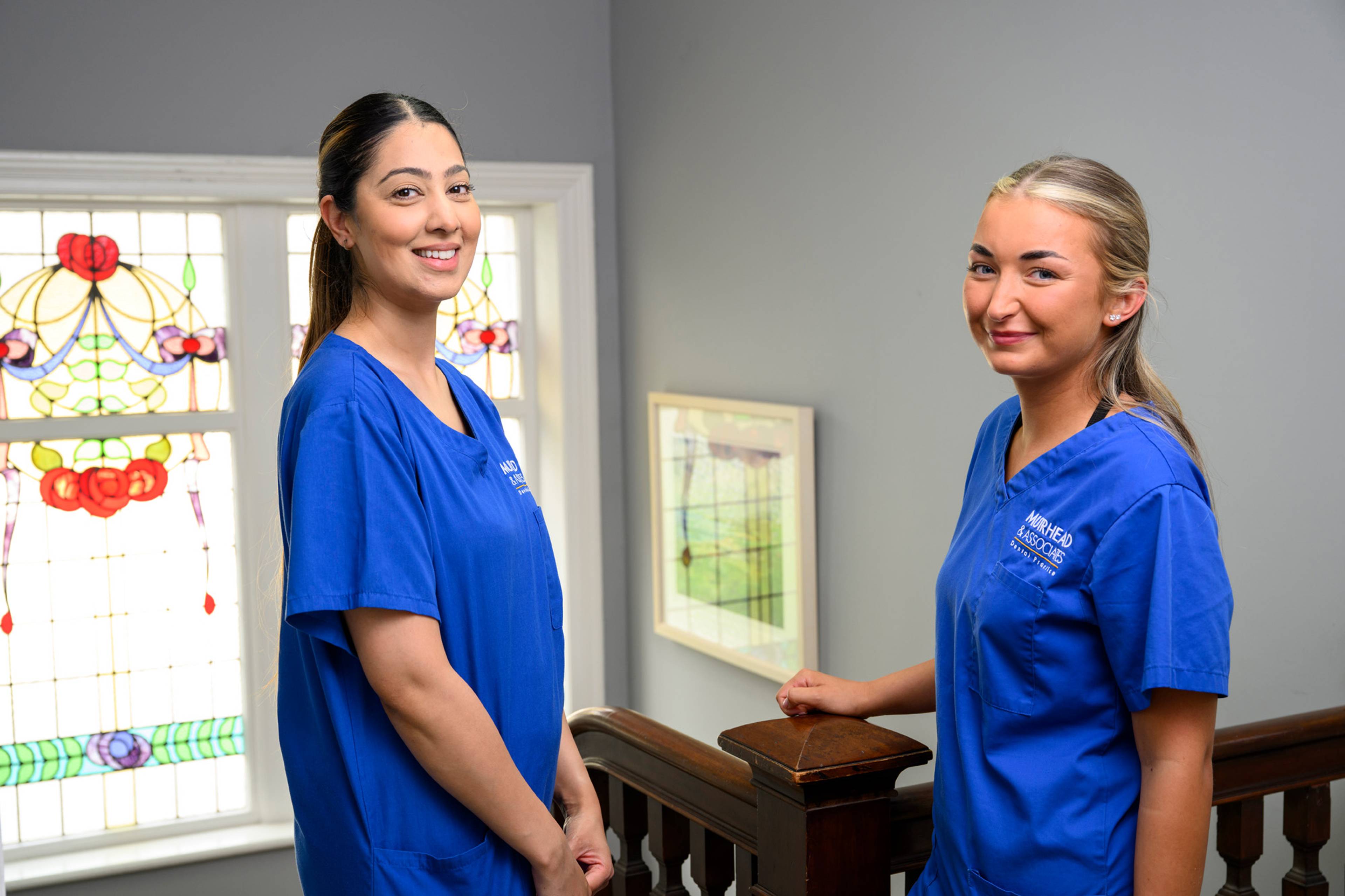 Two smiling dental nurses