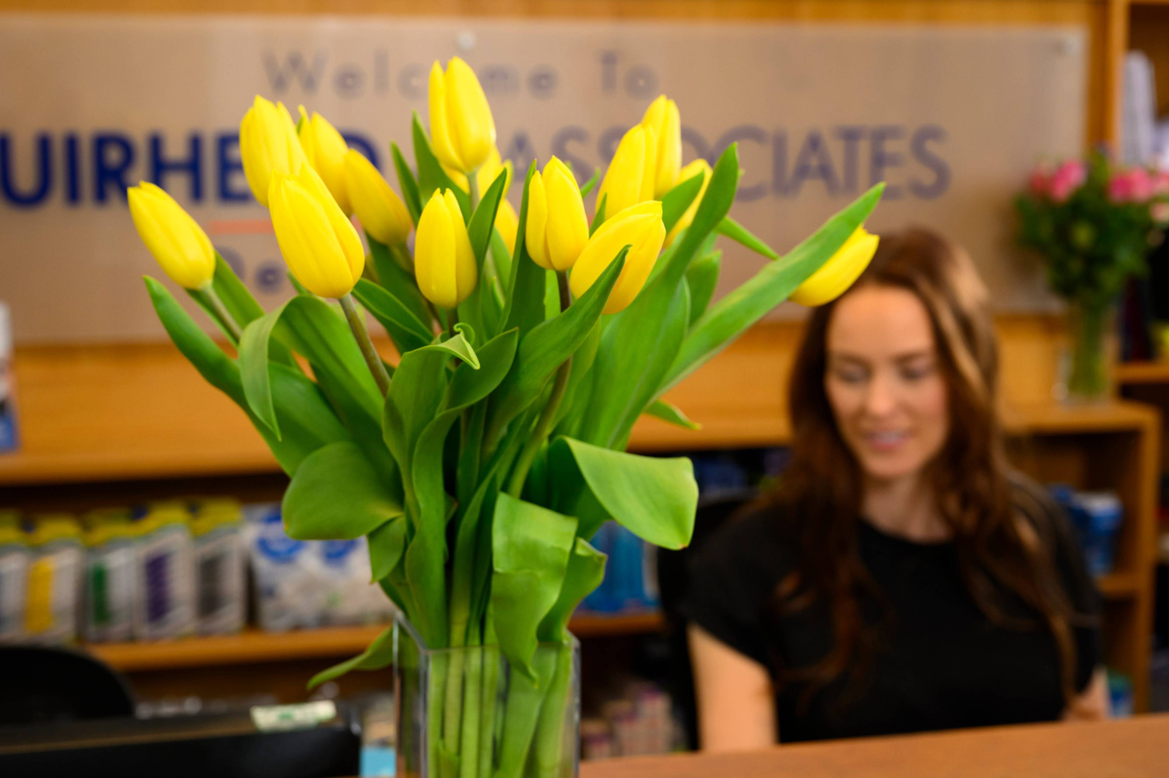 Tulips on the front desk of the Muirhead & Associates practice