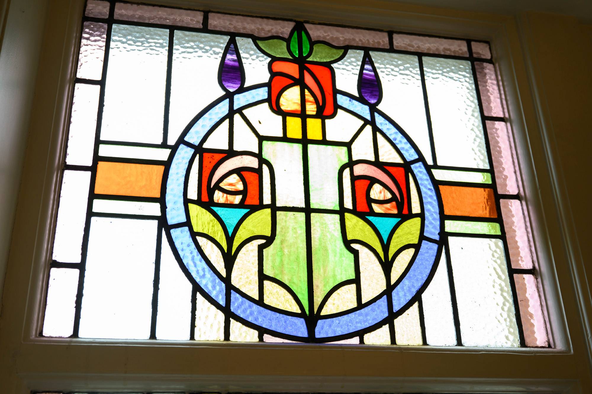 A stained glass window in the practice
