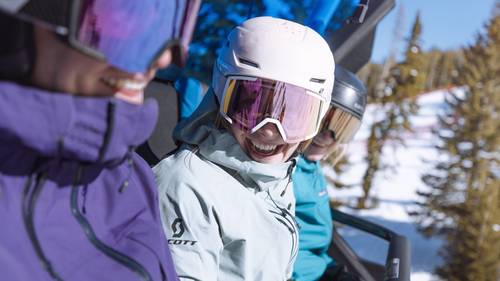 Group of women in ski gear on a chairlift
