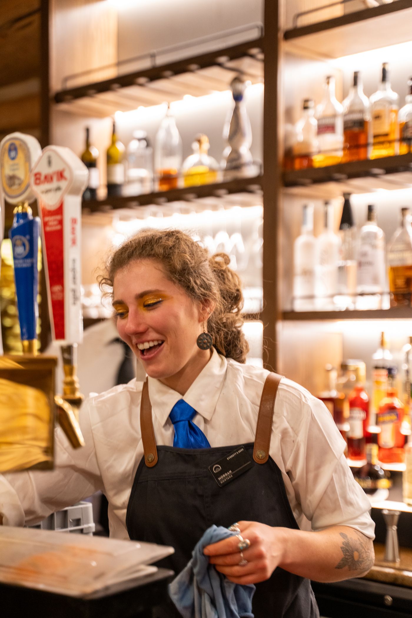 Woman working at a bar