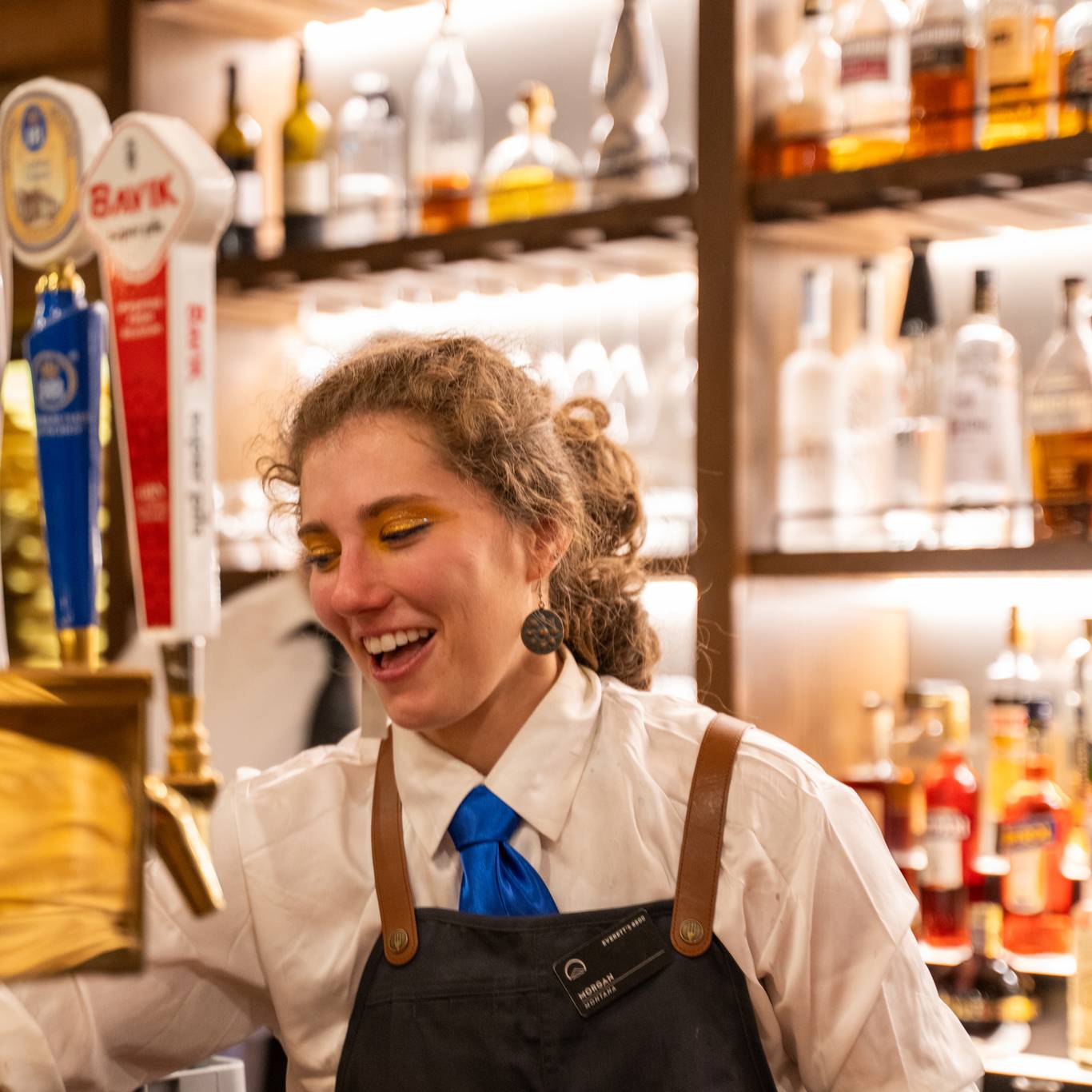Woman working at a bar