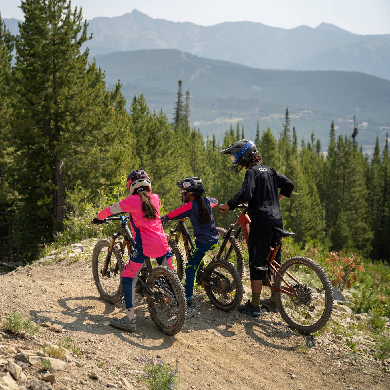 Kids with a mountain biking instructor