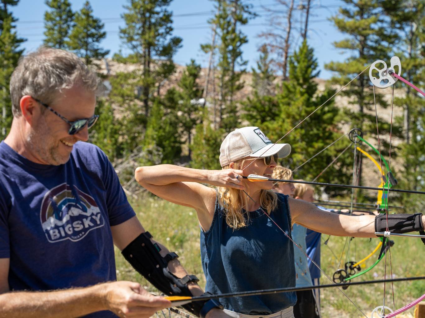 People with bow and arrows at Big Sky Resort