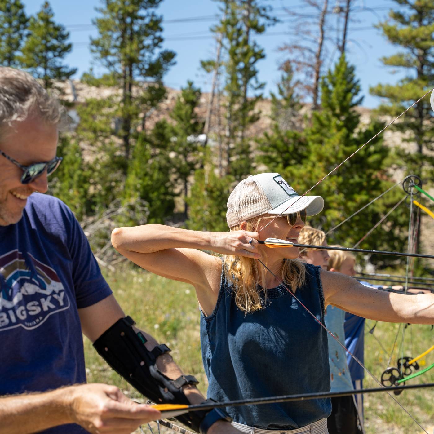 People with bow and arrows at Big Sky Resort