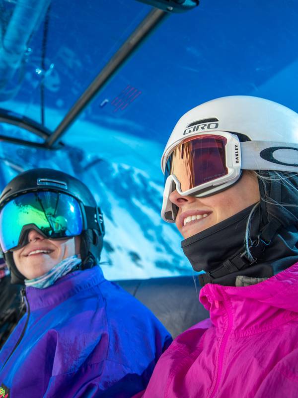Skiers on Powder Seeker