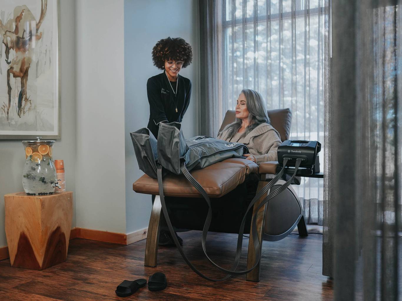 Woman in the Solace Spa Recovery Lounge