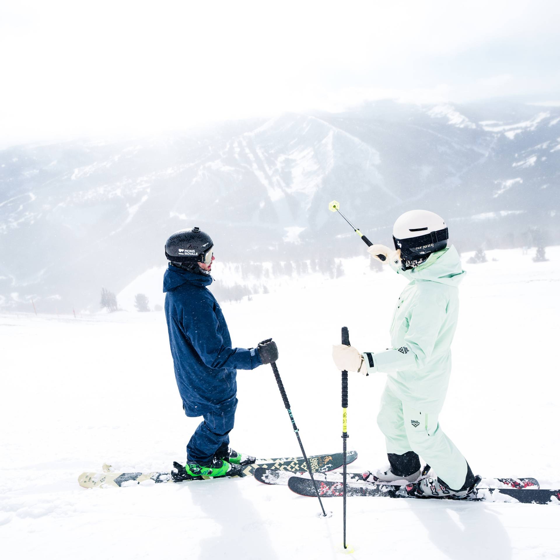 Skiers at the top of Lone Mountain