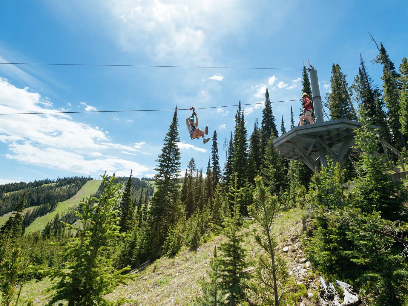 Person on a zipline at Big Sky Resort