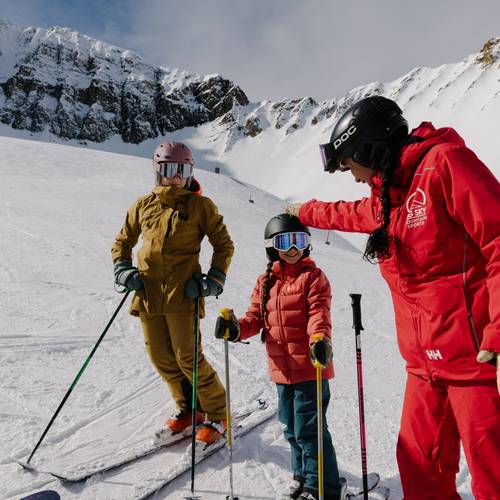 Family in a ski lesson