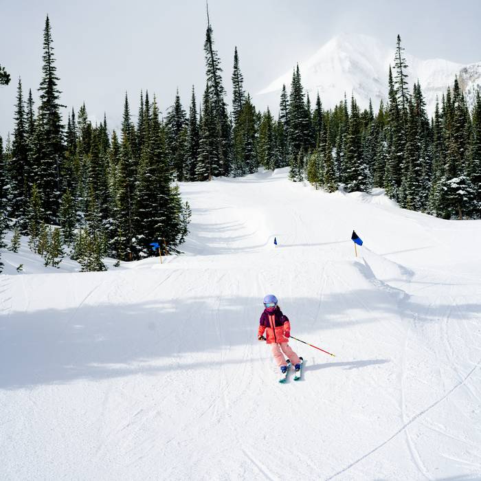 Girl skiing in a terrain park