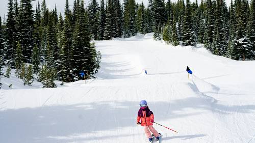 Girl skiing in a terrain park