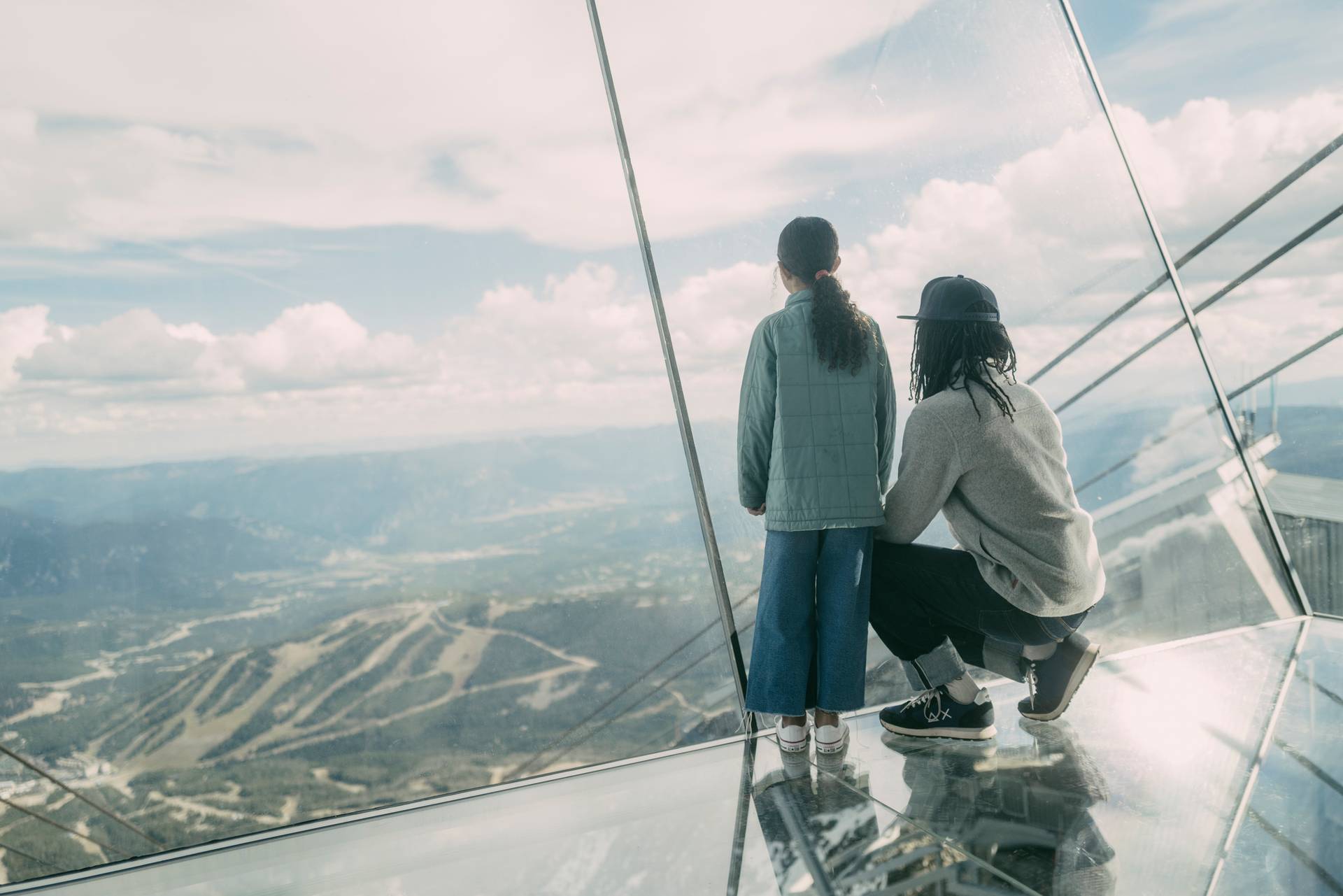 Girl and her dad looking out from Kircliff