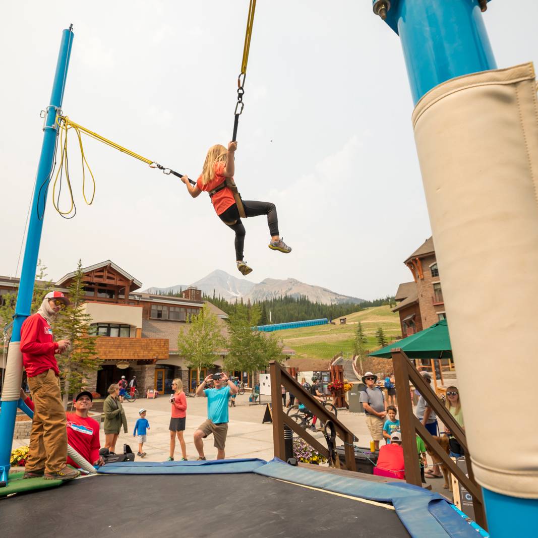 Girl on a bungee trampoline