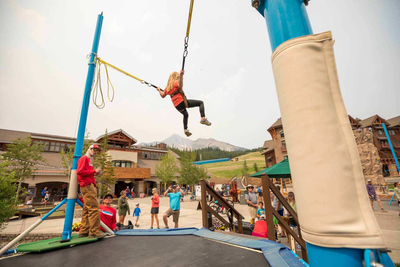 Girl on a bungee trampoline