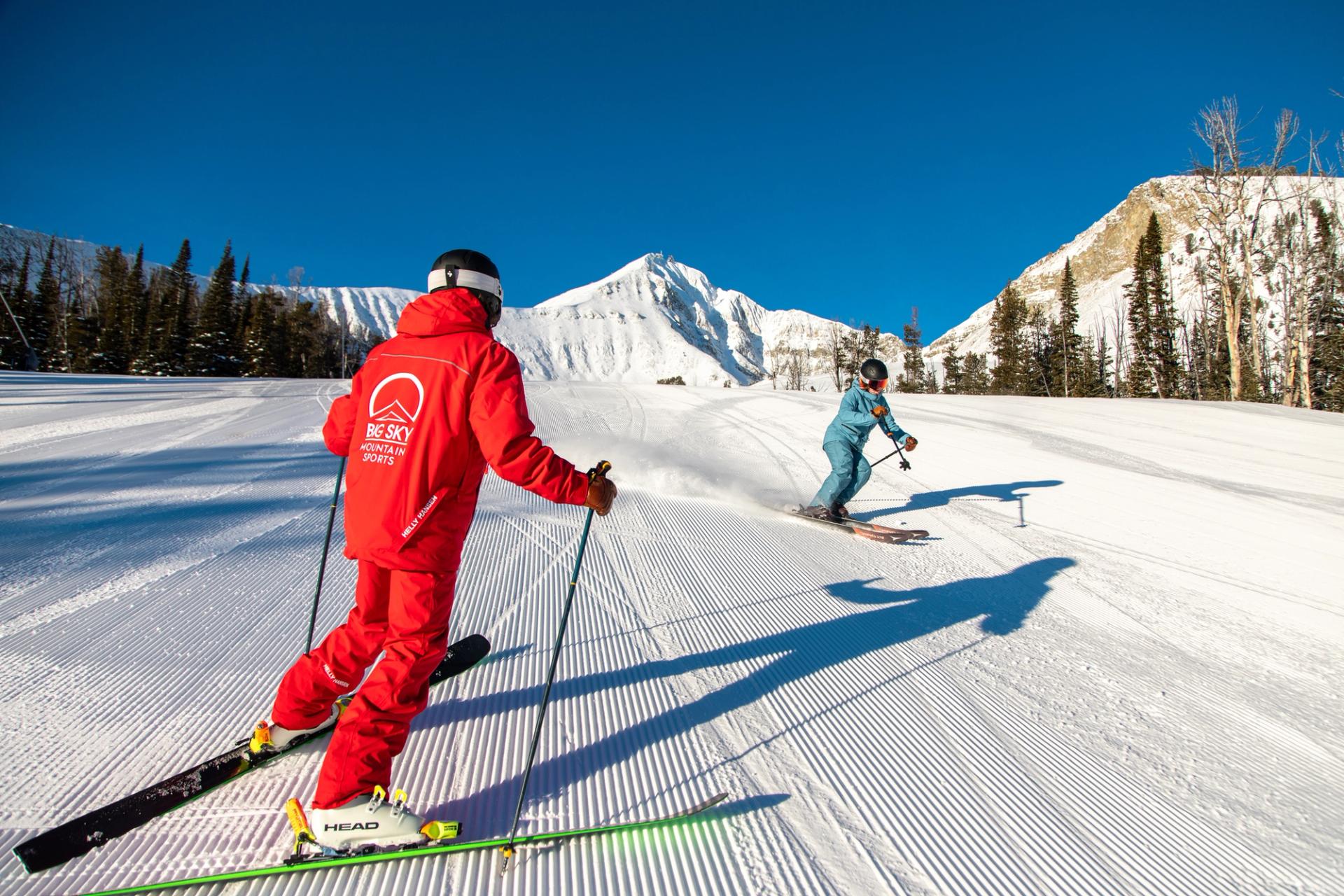 A skier with their instructor