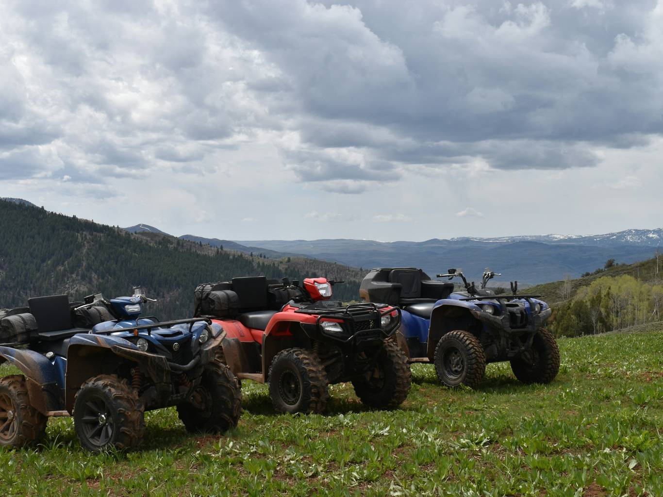 ATVs on a ridgeline in summer