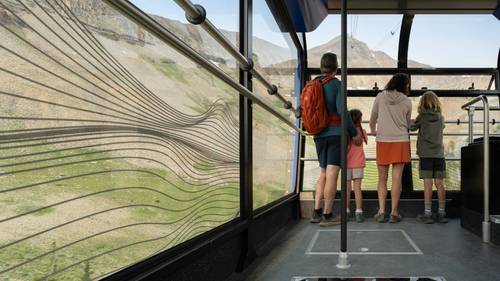 Family on a tram ride in summer